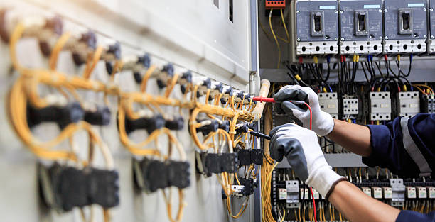 Professional Electrical Panel Upgrade technician working in Howard County County, IA